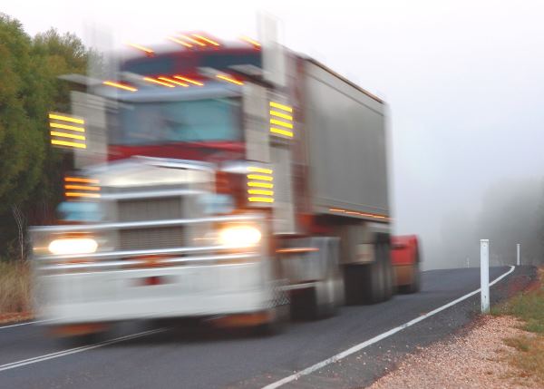 truck with gravel on the road